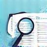 Magnifying glass examining print quality