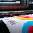 Large-format printer producing a vibrant poster